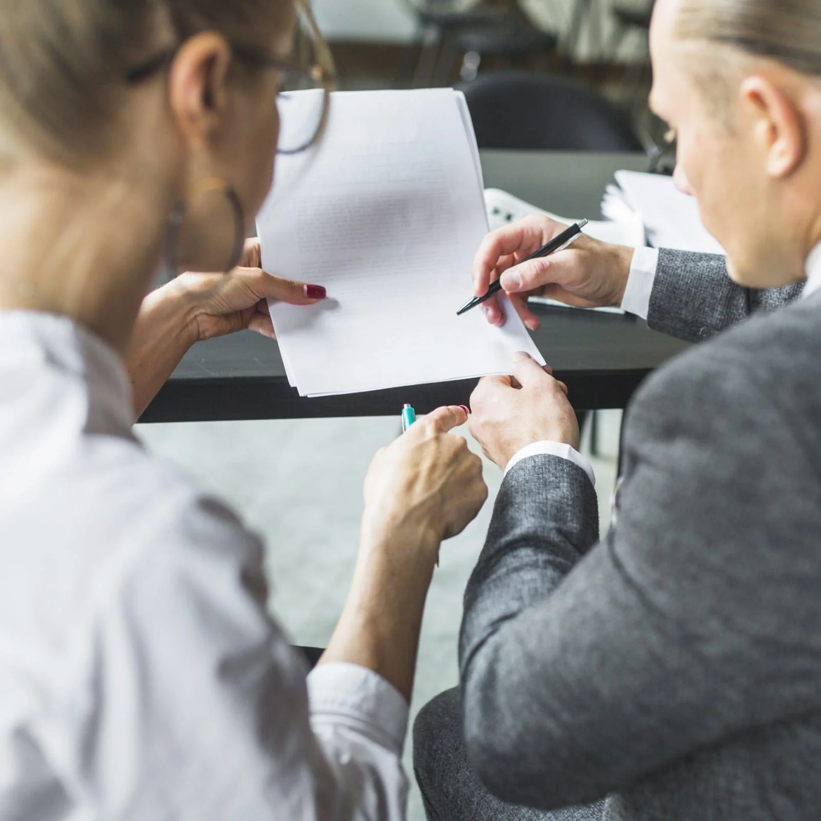 Attorney reviewing document with client